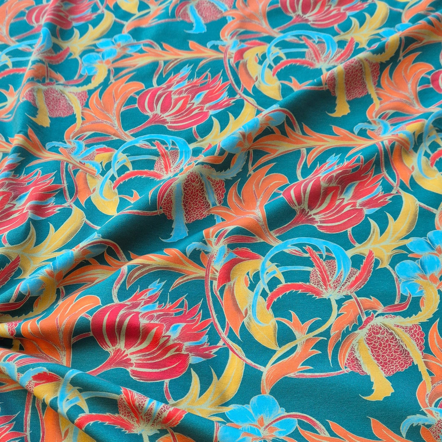 Oda turquoise, zelfontworpen exclusieve tricot met biologisch katoen