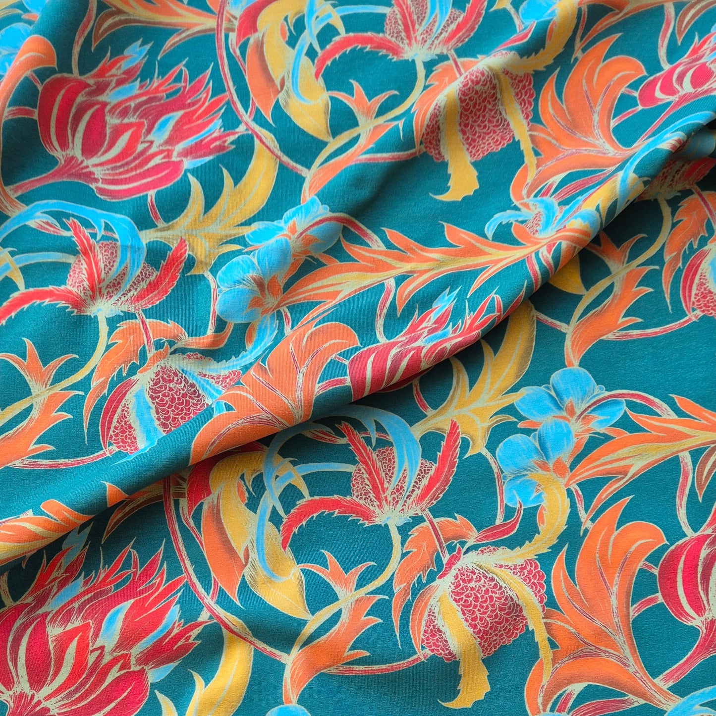Oda turquoise, zelfontworpen exclusieve tricot met biologisch katoen